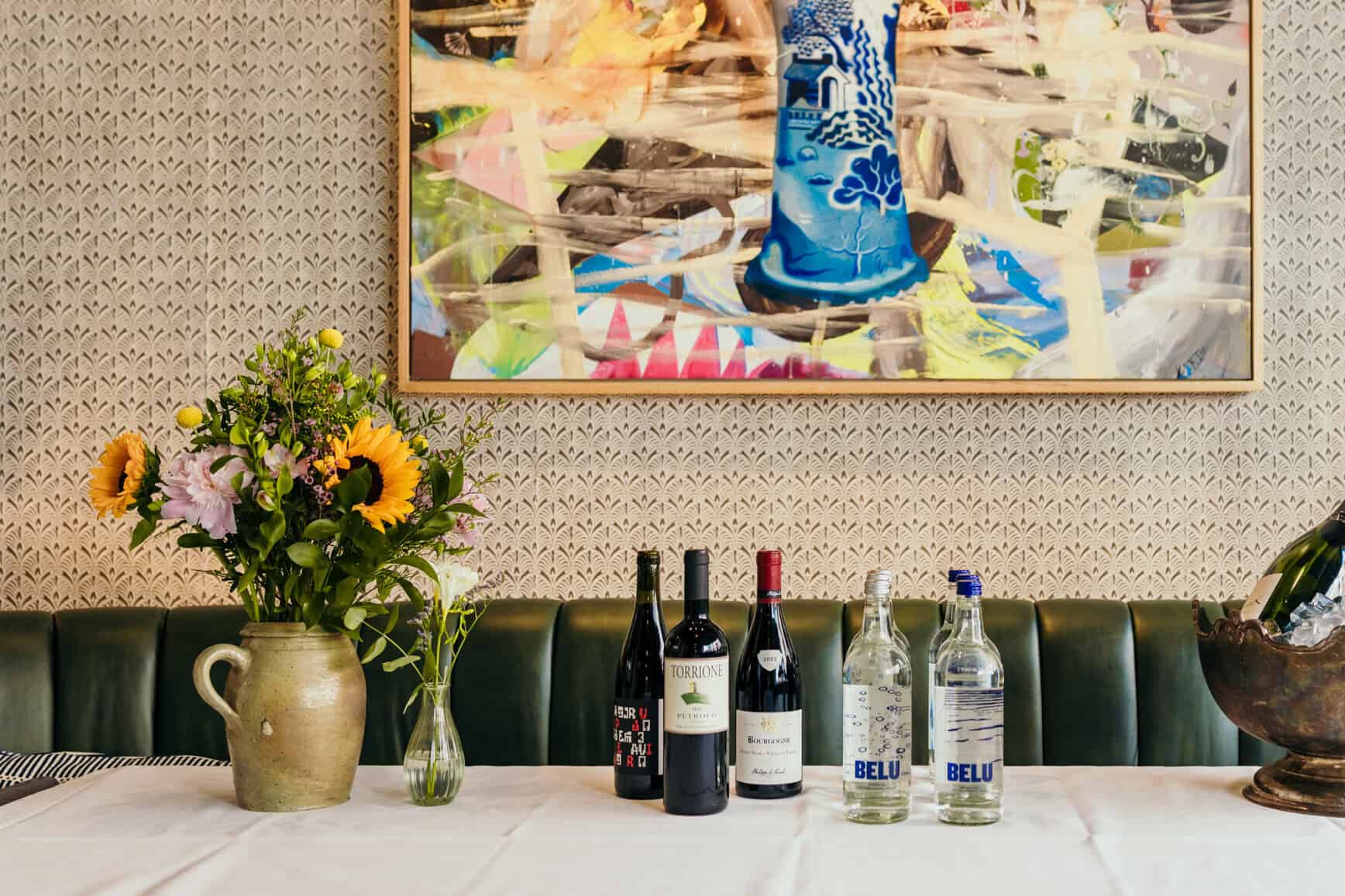 Interior shot of Jamie Oliver Catherine St with a table decorated for a wedding reception